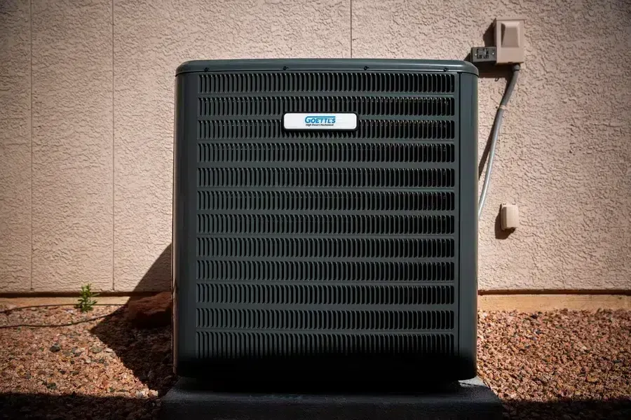 Outdoor Goettl HVAC condenser unit next to home exterior – Prescott Valley AZ
